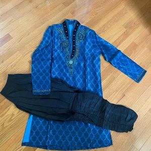 Indian traditional wear for kids which is called a Sherwani.